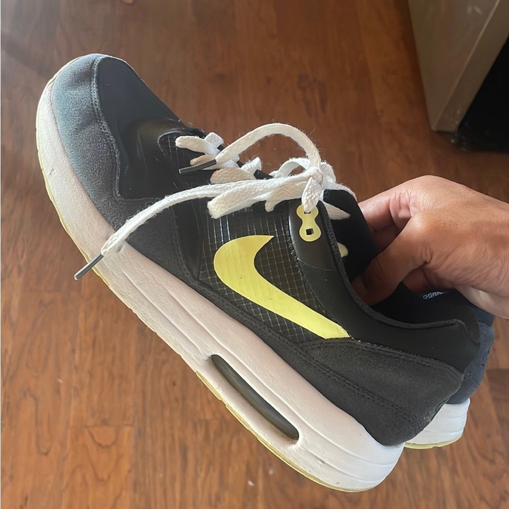 Black Nike Air max 1 athletic shoes for men